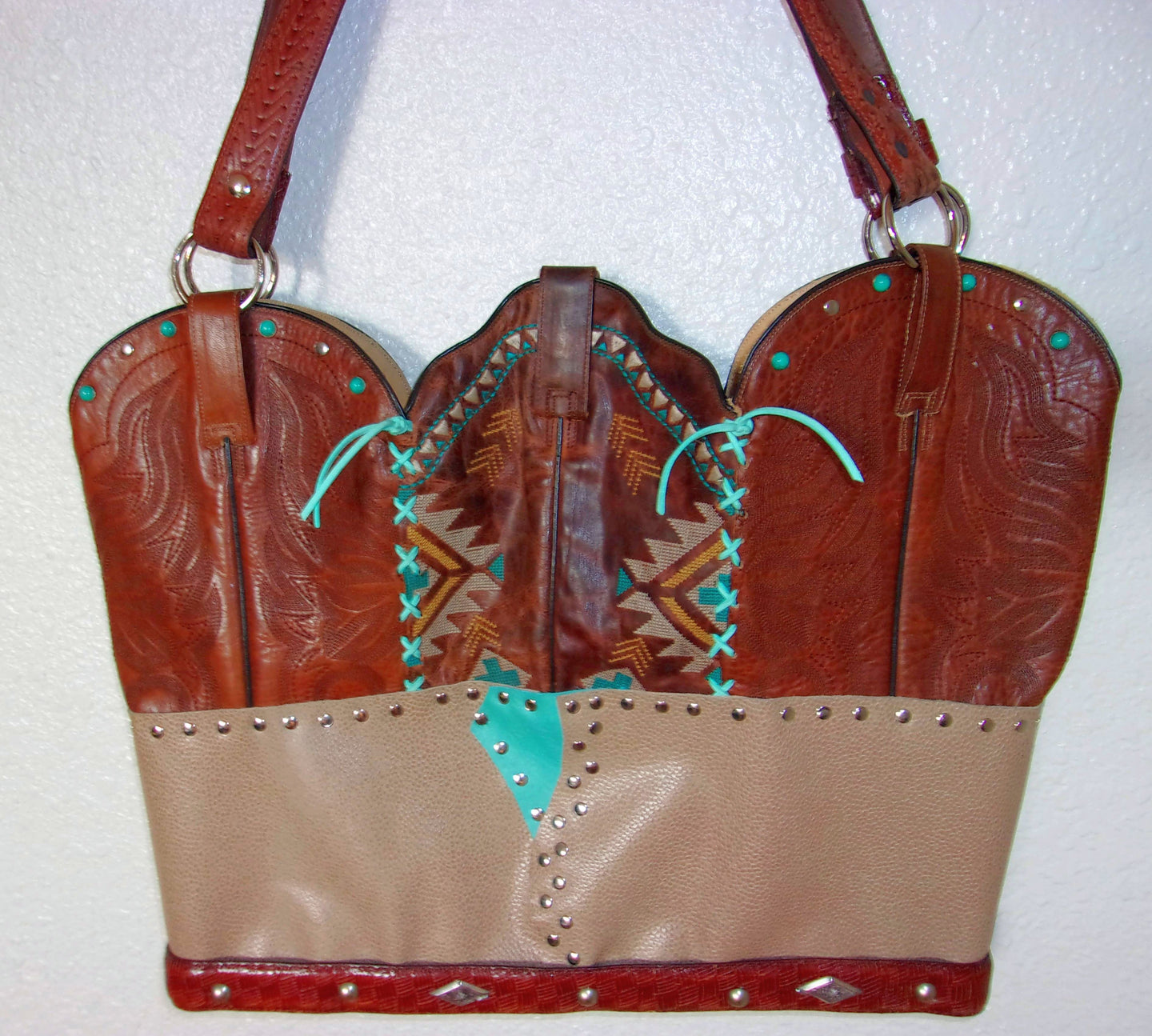 Cowboy Boot Laptop Tote LT31 handcrafted from cowboy boots. Shop Handbags at ChrisThompsonBags.com and buy the best boot purse, cowboy boot purse, cowgirl handbag, leather laptop tote, recycled cowboy boots, unique gift for her, unique gift for him, unique travel bag, western diaper bag, western laptop tote, western travel bag, XL cowboy Boot Purse, XL leather tote at Chris Thompson Bags.